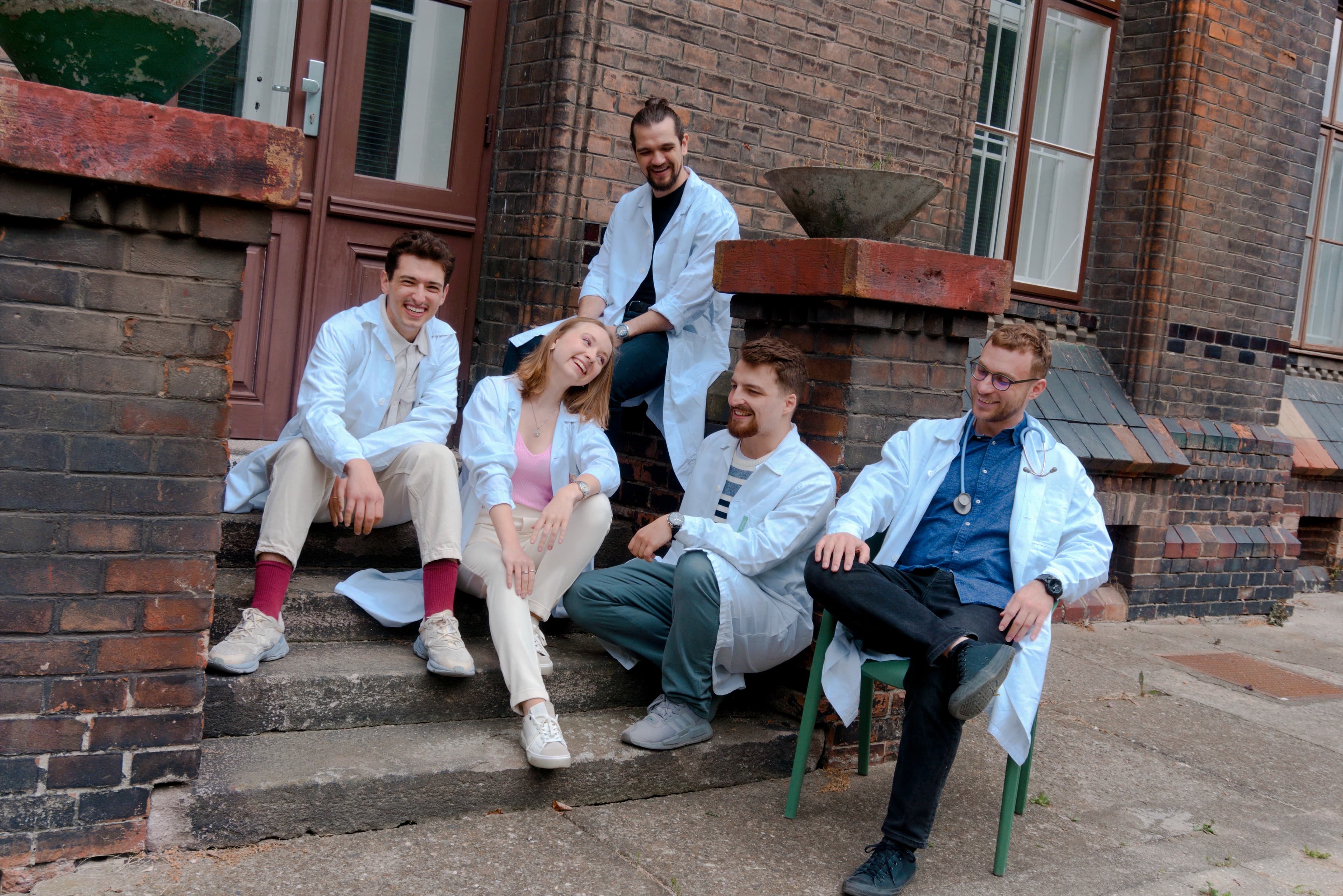 The MedCzech teaching team on the steps of the faculty building in Prague